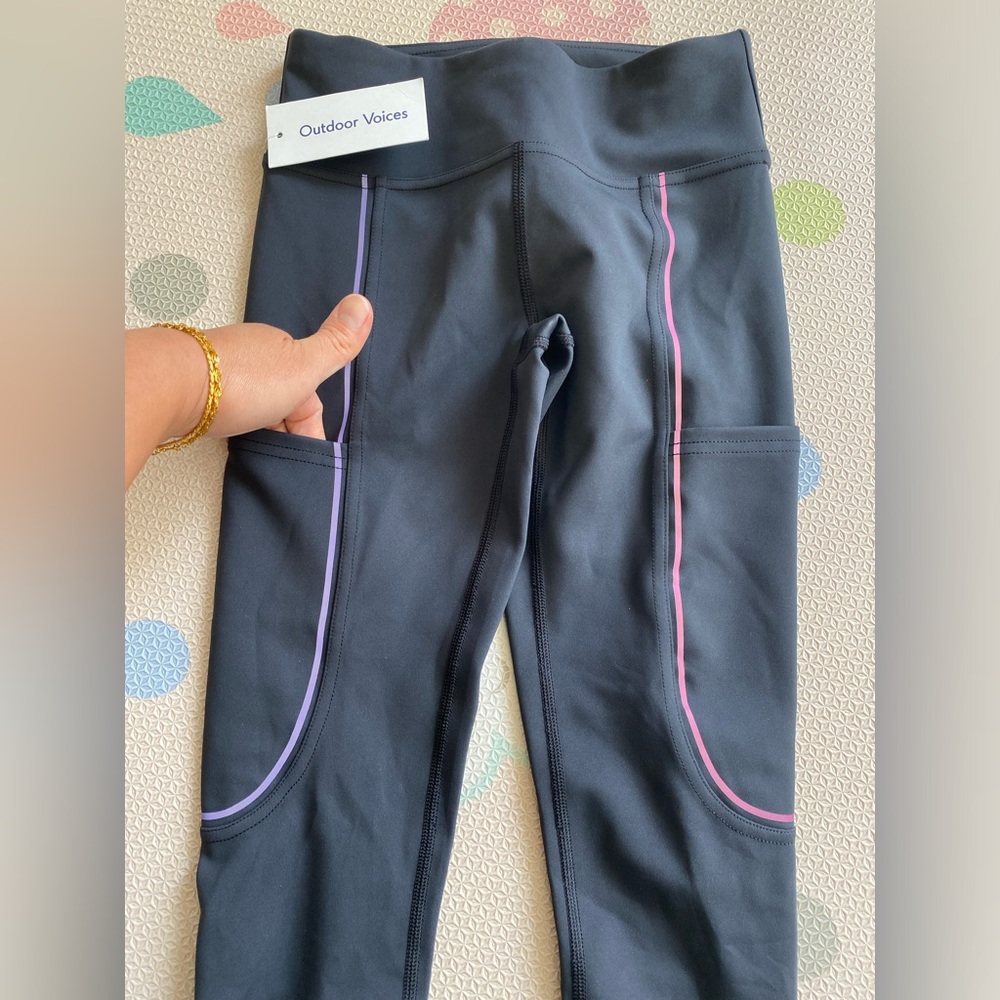 NWT Outdoor Voices yoga pants 2 side pockets in Black/rainbow reflective